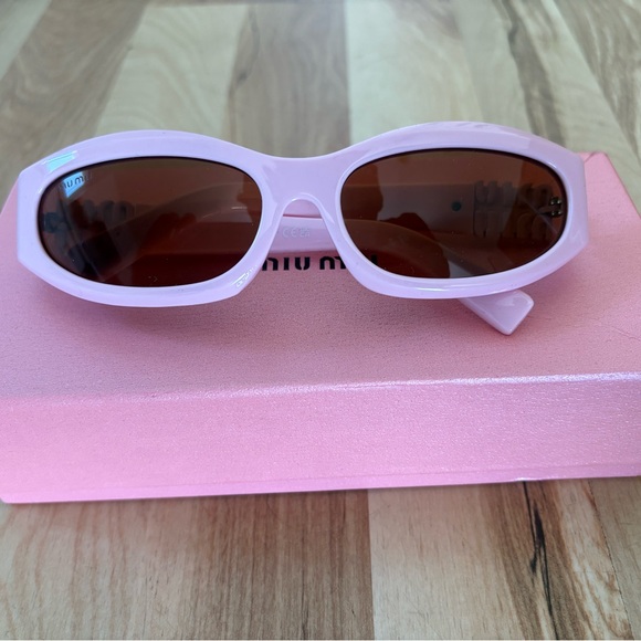 Miu Miu Light Pink Sunglasses - Picture 1 of 7